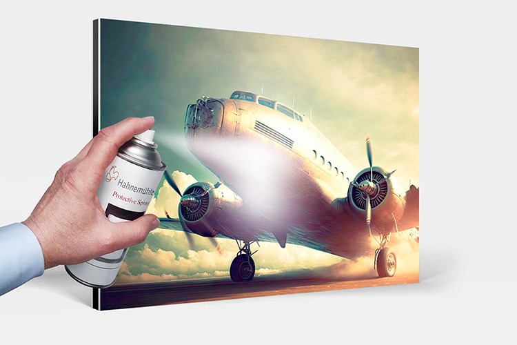 A photographic print mounted on Dibond to which Hahnemühle invisible protection spray is applied.